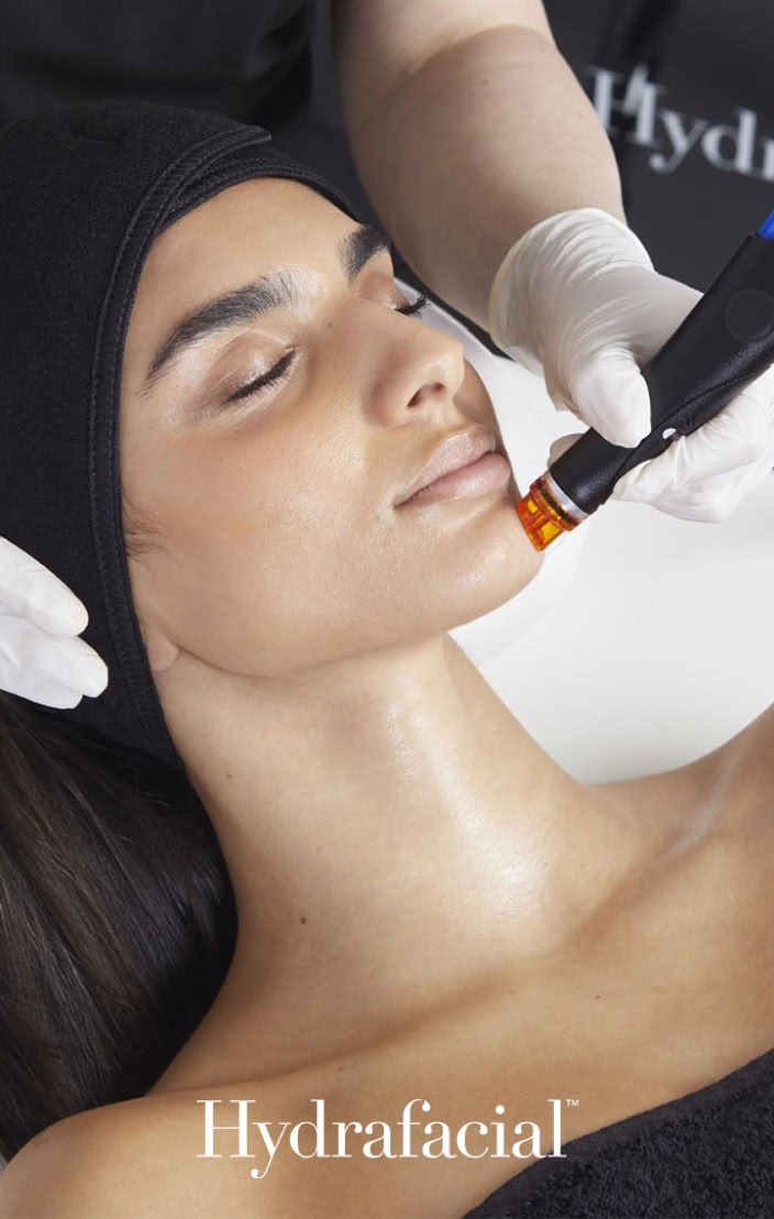 Experience a customized HydraFacial® treatment by Ana Tagliaferro designed to deeply cleanse, extract impurities, hydrate, and restore radiant skin. Enhanced with personalized boosters and LED Light Therapy for a refreshed, healthy-looking complexion in Coral Gables, Miami.
